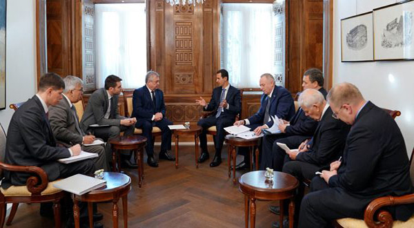 Syrian President Bashar al-Assad and the Russian delegation